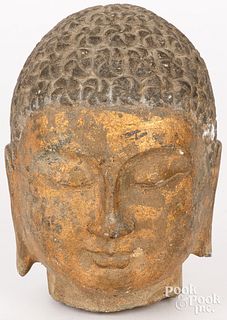 Carved stone buddha head