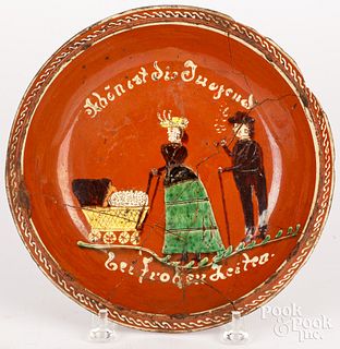 Unusual German slip decorated redware plate