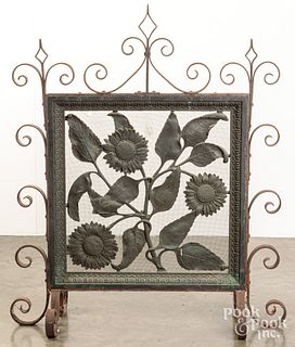 Iron fire screen with sunflower design