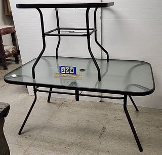 METAL BASE GLASS TOP PATIO TABLE 28 1/2"H X 5'L X 38"W W/ UMBRELLA & METAL BASE GLASS TOP PATIO TABLE 27 1/2"H X 33"SQ. ( By The Office Door)
