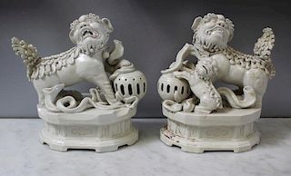 Pair of Blanc de Chine Chinese Foo Dogs.