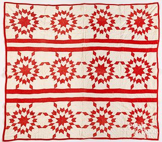 Red and white touching star patchwork quilt