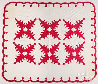 Red and white Hawaiian appliqué quilt