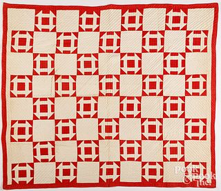 Red and white Hole in the Barn Door quilt