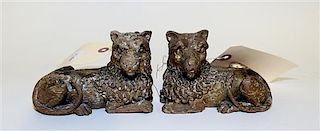 * A Pair of Carved and Gilt Decorated Models of Lions Width 6 inches.