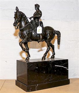 A Continental Bronze Equestrian Group Height overall 19 1/2 inches.