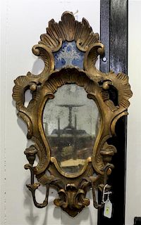 An Italian Baroque Style Giltwood Mirror Height 20 x width 12 inches.