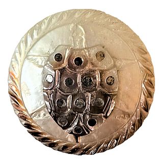 A Division One Carved Pearl Button With Steel Insets