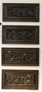 * A Set of Four Continental Carved Wood Panels Height 11 1/4 x width 23 1/2 inches.