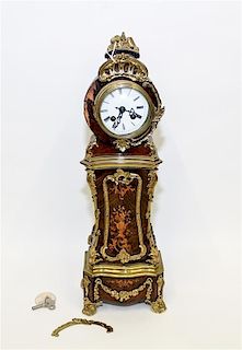 * A Gilt Metal Mounted Diminutive Tall Case Clock Height 19 inches.