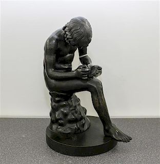 * A Continental Bronze Figure, After the Antique Height 11 1/2 inches.