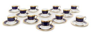 A Set of Wedgwood Demitasse Cups and Saucers Diameter of saucers 4 7/8 inches.