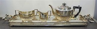 * An English Silver-Pate Three Piece Tea Service Width of tray over handles 28 1/2 inches.