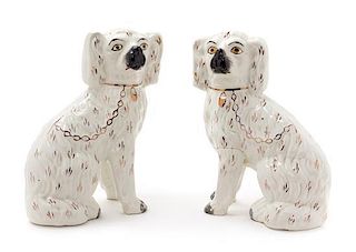 * A Pair of Staffordshire Spaniels Height of first pair 10 inches.
