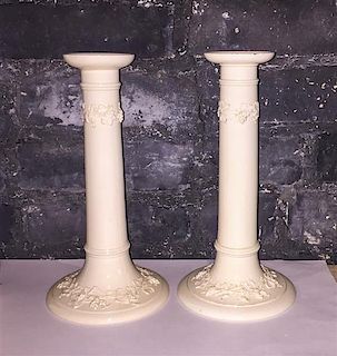 * A Pair of Wedgwood Creamware Candlesticks Height 10 inches.