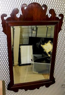 * A Hanging Mahogany Mirror Height 48 1/4 x width 29 inches.
