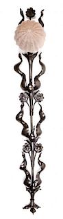 * An Art Nouveau Bronze and Glass Sconce, 20TH CENTURY, the backplate of foliate form with a later globe shade