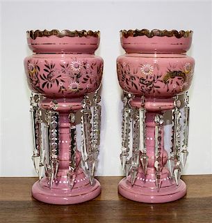 A Pair of Pink Glass Mantle Lustres Height of 10 1/2 inches.