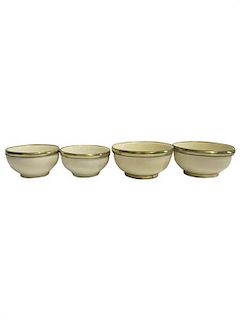 * Four Silver-Plate Mounted Ceramic Bowls Height of larger pair 2 3/8 x diameter 2 3/8 inches.