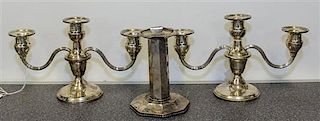 A Pair of American Silver Three-Light Candelabra, , having reeded arms with baluster form cups and stems, together with anoth