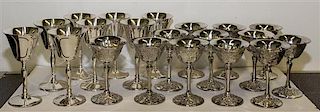 A Group of Twenty Silver-Plate Stems Height of taller 5 3/4 inches.