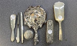 * An American Assembled Silver Dressing Set Length of longest 9 3/4 inches.