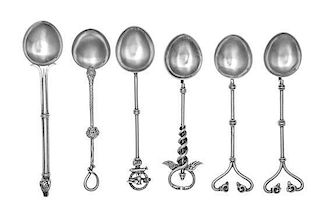 A Collection of Six Continental Silver Souvenir Spoons, , three with ram's mask decorated handles, one with a Medusa mask, on