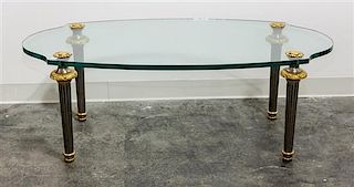 * A Neoclassical Style Gilt, Silvered Bronze and Glass Low Table Width 48 inches.