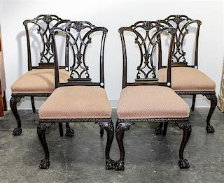 A Set of Four Irish Chippendale Style Mahogany Dining Chairs. Height 40 inches.