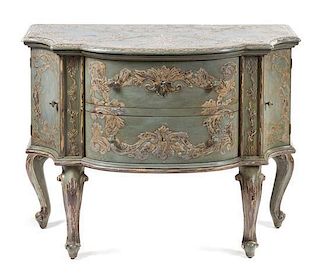 A Venetian Style Painted and Silvered Commode Height 31 1/2 x width 42 x depth 19 1/2 inches.