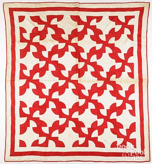 Red and white Drunkards Path patchwork quilt
