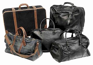 Five Black Leather and Cloth Suitcases