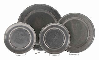 Four Pewter Chargers and Platters