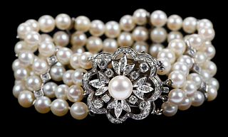 14kt. Four Strand Pearl and Diamond Bracelet