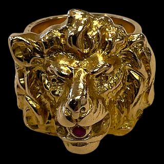 18 kt Yellow Gold Lion Ring with a Ruby Colored Stone In Its  Mouth from the Surreal Collection 