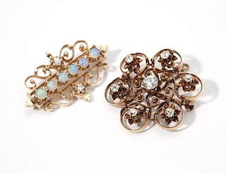 A pair of Victorian diamond and gold brooches