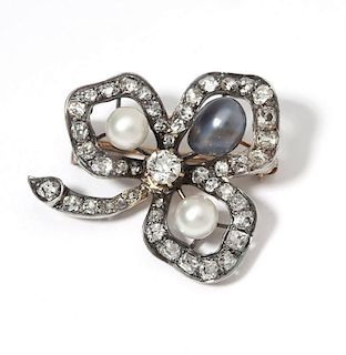 An antique silver-topped & diamond clover brooch