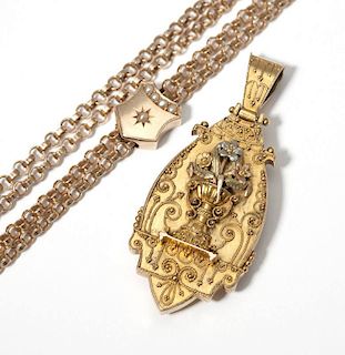 A Victorian gold chain and gold-filled locket