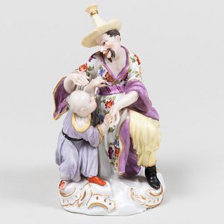 Early Meissen Chinoiserie Figure Group of a Man and Child, Modeled by Peter Reinicke
