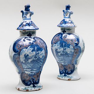 Pair of Dutch Delft Polychrome Vases and Covers with Dancing Couple