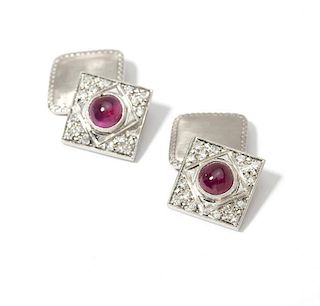 A pair of ruby and white gold cufflinks