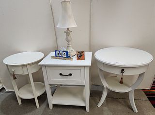 lot 2 shite round side tables 29 1/2"h x 26" diam and 28" x 20" and 1 drawer stand 28 1/2"h x 24"w x 18"d and 1 lamp
