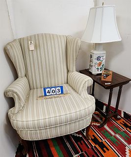 uphols wing chair , mahog sidde table and lamp