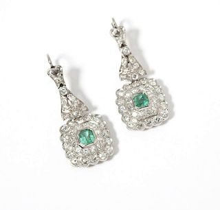 A pair of diamond, emerald & white gold earrings