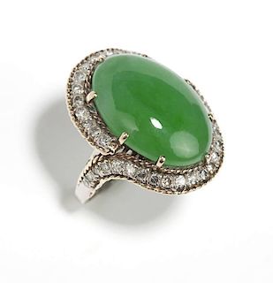 A jadeite cabochon, diamond and white gold ring