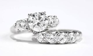A diamond and white gold wedding set