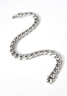 A platinum curb link bracelet