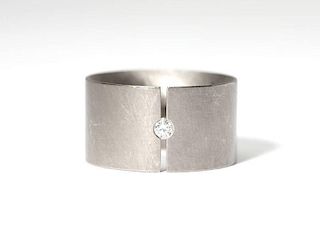 A diamond and white gold tension ring, Niessing