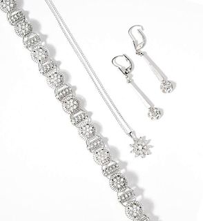 A collection of diamond and white gold jewelry