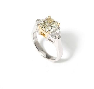 A radiant-cut colored diamond ring